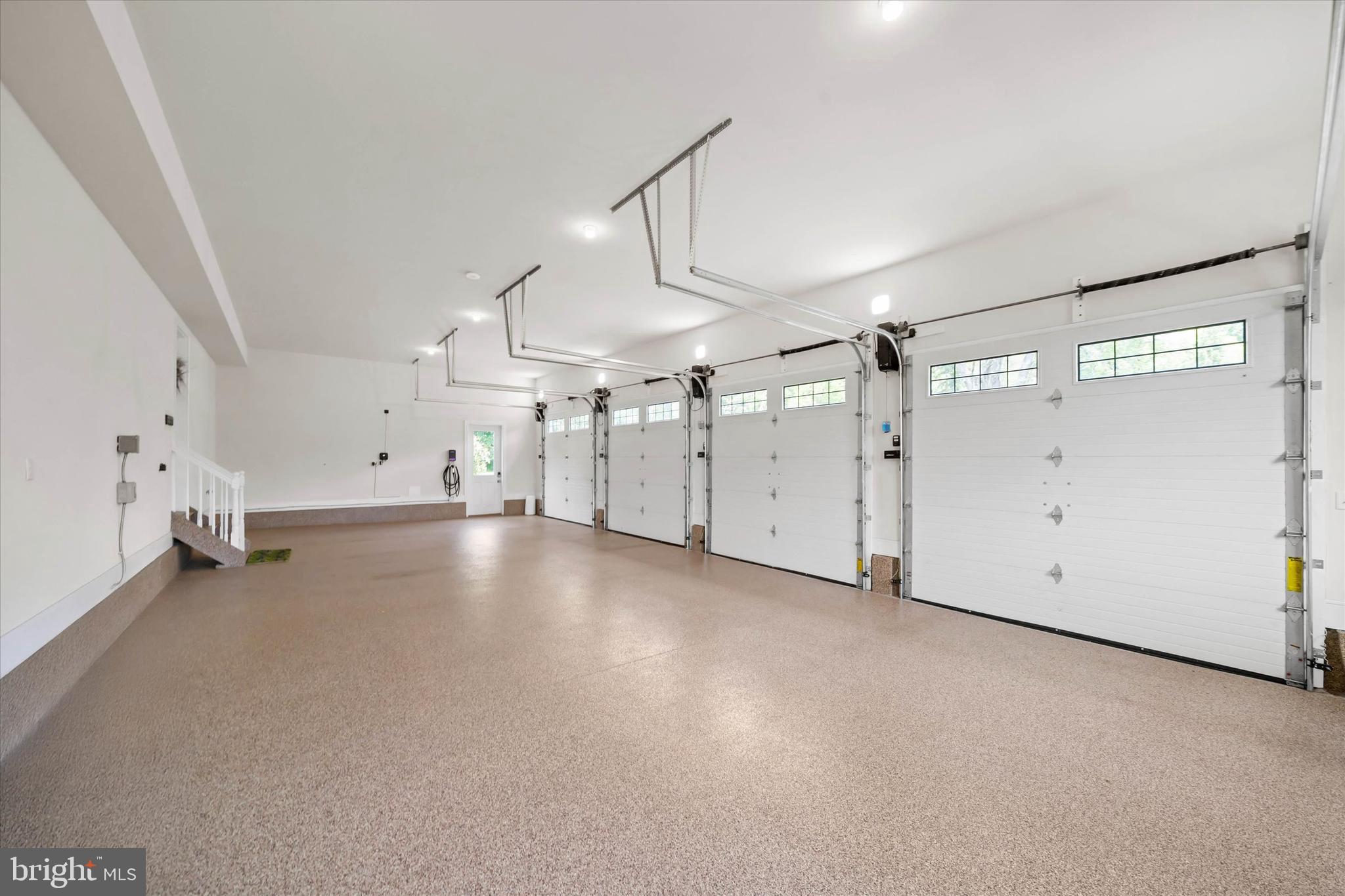 5 Raintree Road Chadds Ford, PA 19317 - Photo 12 of 58 4 car garage with epoxy floor, EV chargers