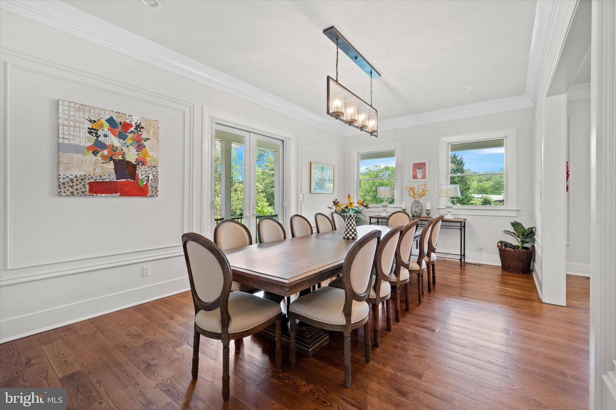 5 Raintree Road Chadds Ford, PA 19317 - Photo 15 of 58 a view of a dining room with furniture window and wooden floor