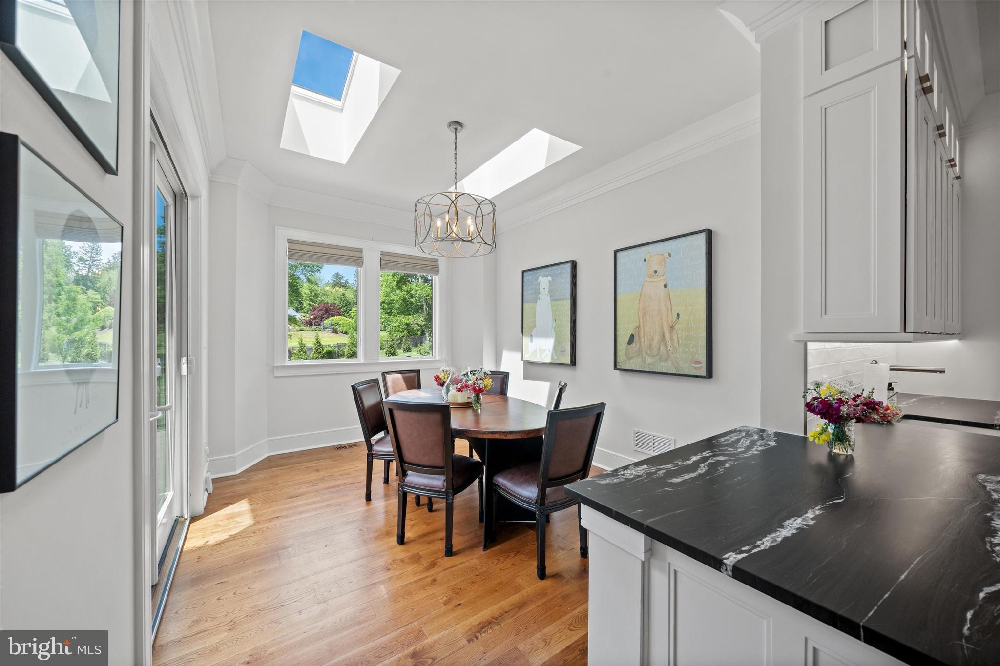 5 Raintree Road Chadds Ford, PA 19317 - Photo 20 of 58 a view of a dining room with furniture and wooden floor