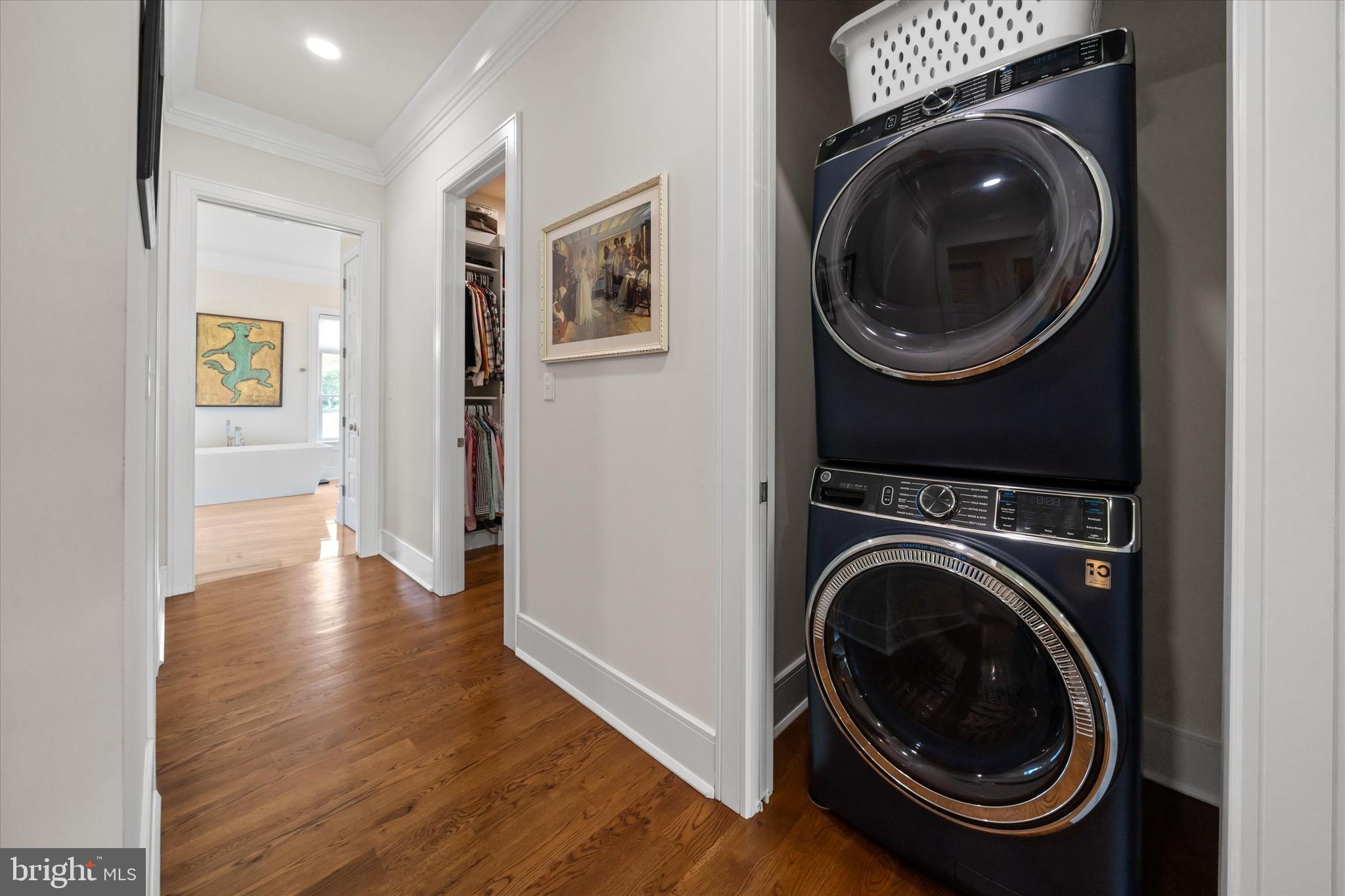5 Raintree Road Chadds Ford, PA 19317 - Photo 22 of 58 a view of a hallway with washer and dryer