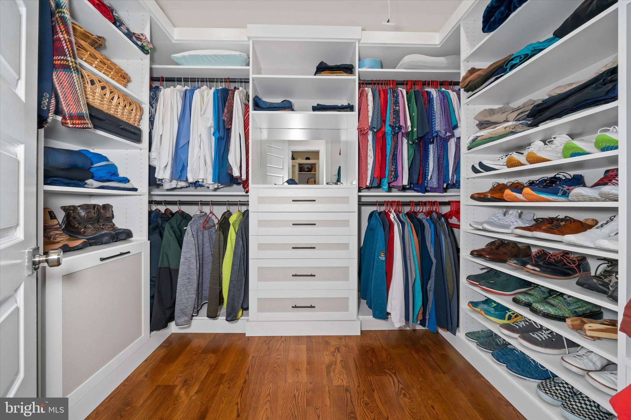 5 Raintree Road Chadds Ford, PA 19317 - Photo 23 of 58 a view of walk in closet with clothes and shoes