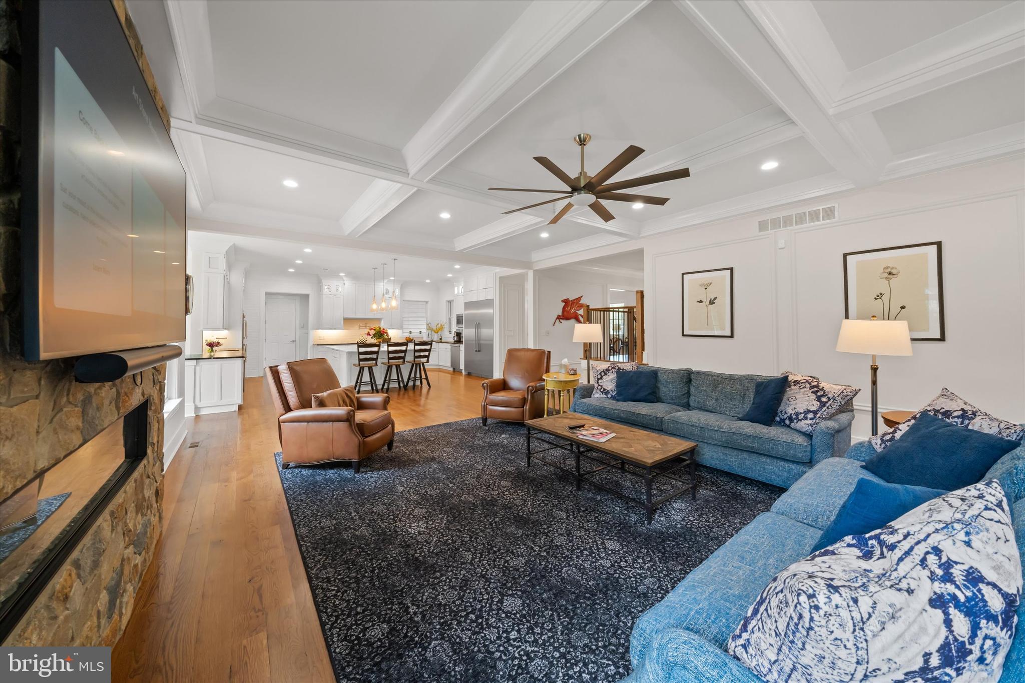5 Raintree Road Chadds Ford, PA 19317 - Photo 33 of 58 a living room with furniture and a view of kitchen