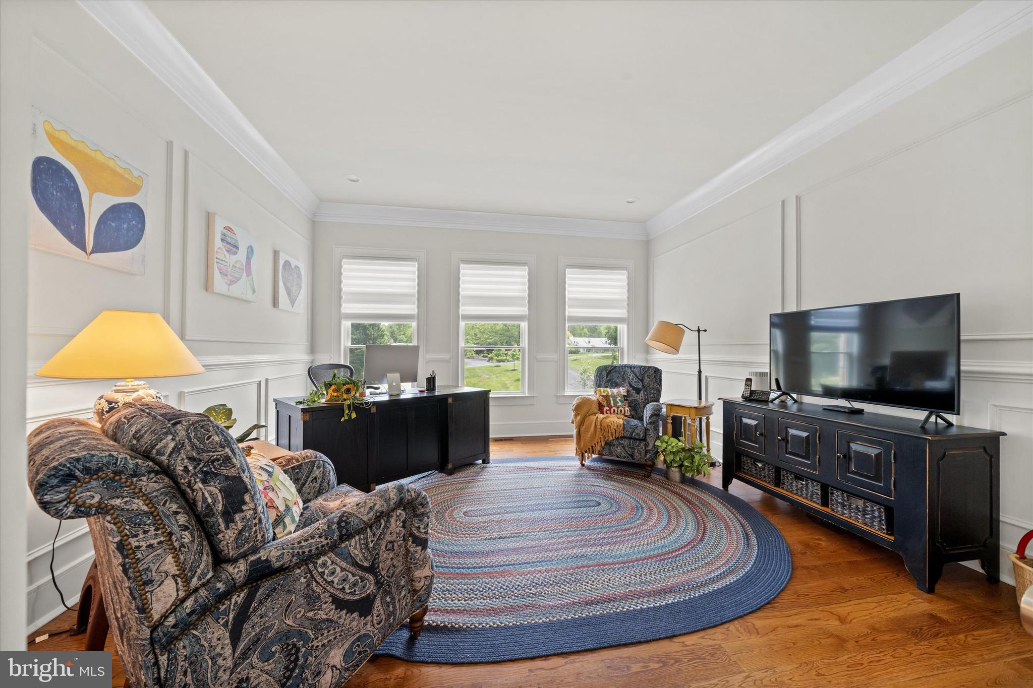 5 Raintree Road Chadds Ford, PA 19317 - Photo 34 of 58 a living room with furniture and a flat screen tv