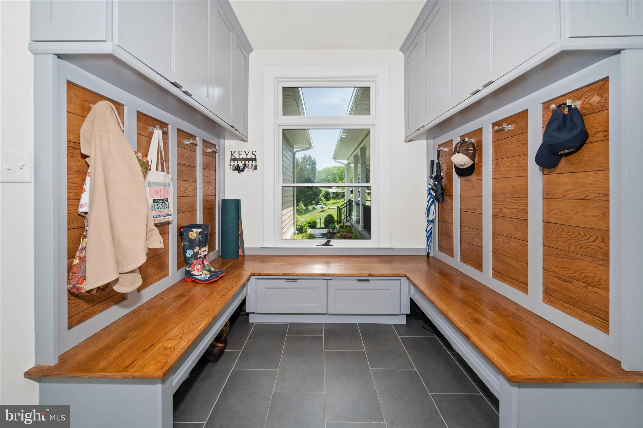 5 Raintree Road Chadds Ford, PA 19317 - Photo 35 of 58 a bathroom with granite countertop sink and natural light