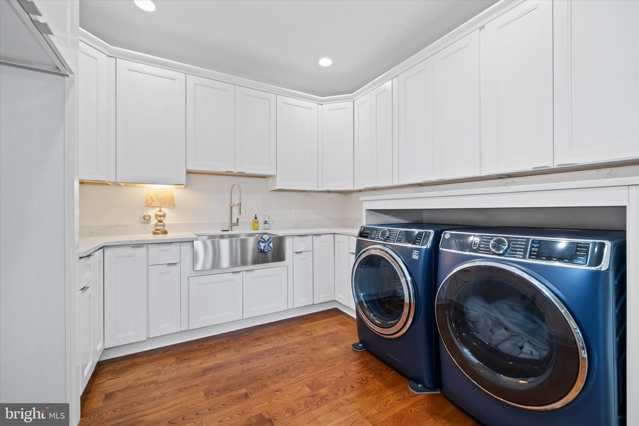 5 Raintree Road Chadds Ford, PA 19317 - Photo 38 of 58 a utility room with sink dryer and washer