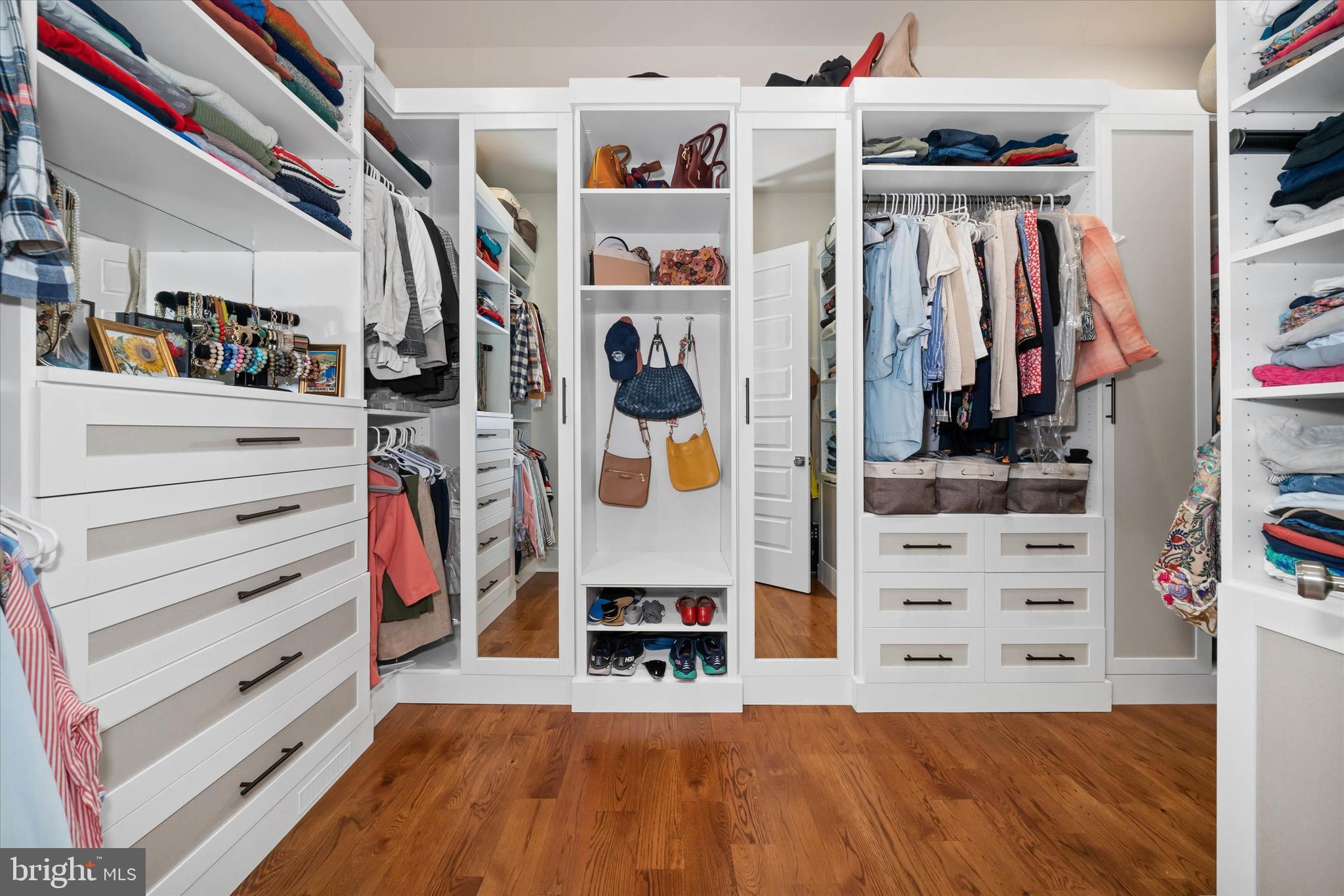 5 Raintree Road Chadds Ford, PA 19317 - Photo 39 of 58 a view of walk in closet with clothes and shoes
