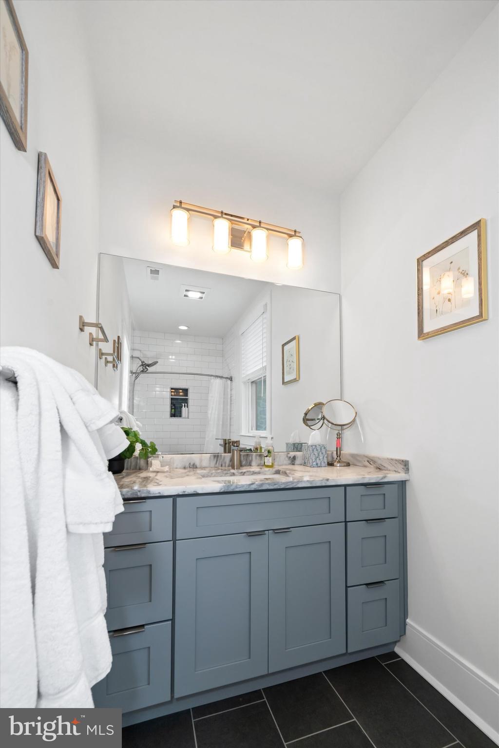 5 Raintree Road Chadds Ford, PA 19317 - Photo 41 of 58 a bathroom with a granite countertop sink mirror and toilet