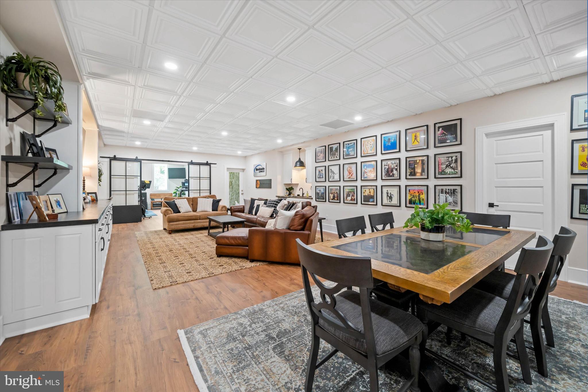5 Raintree Road Chadds Ford, PA 19317 - Photo 47 of 58 a view of a dining room with furniture and a potted plant