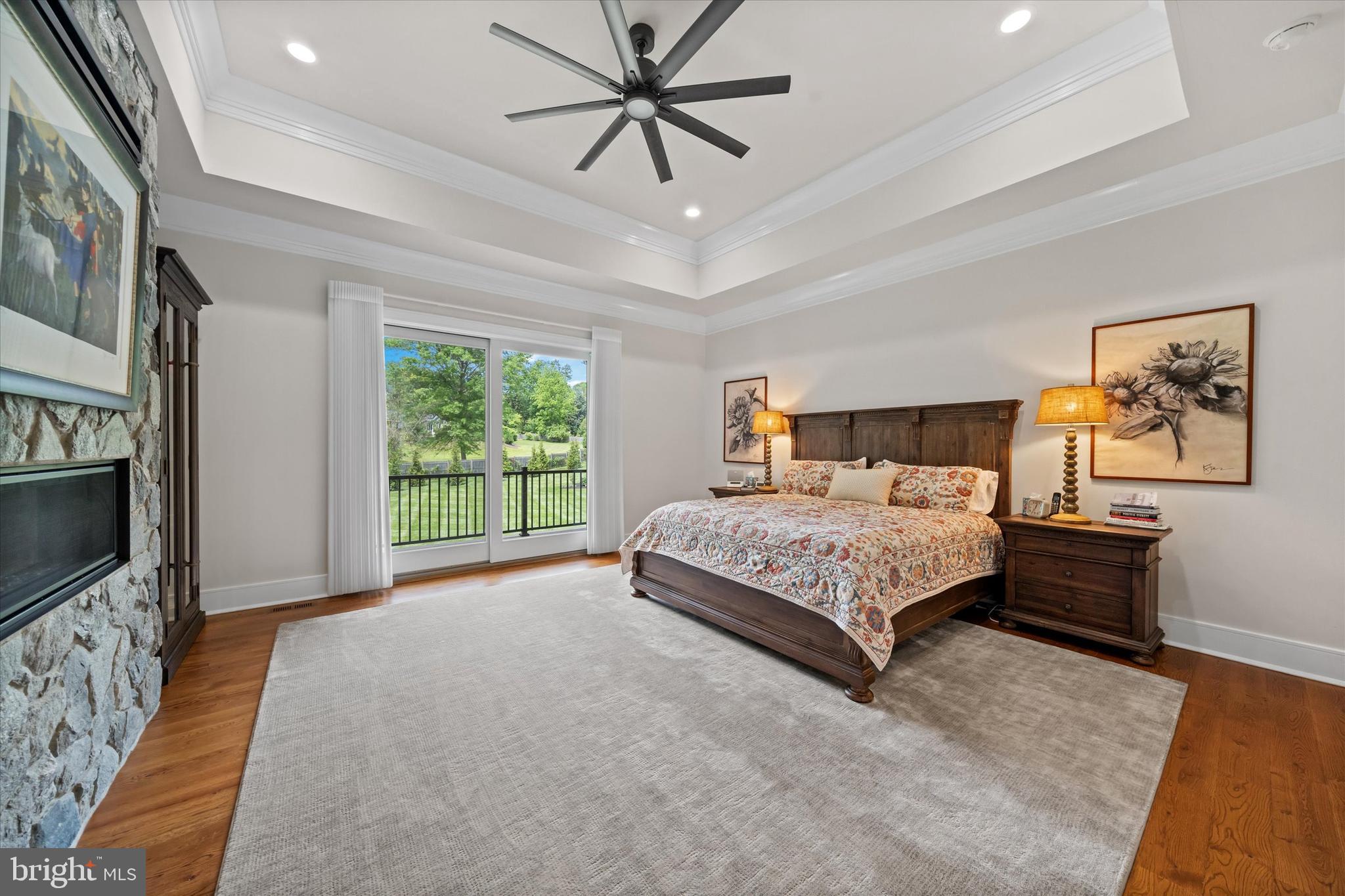 5 Raintree Road Chadds Ford, PA 19317 - Photo 8 of 58 a bedroom with a large bed and a flat screen tv