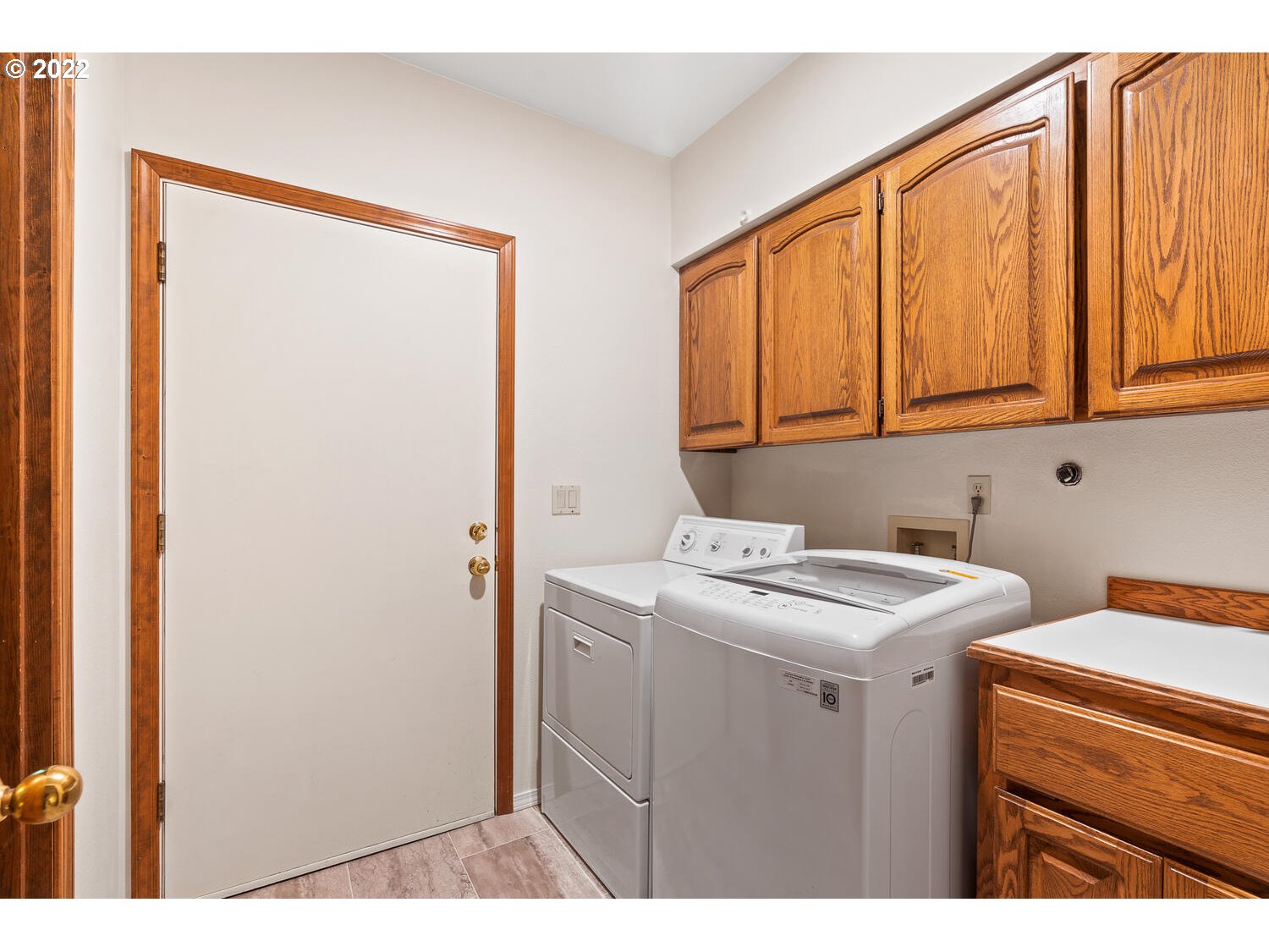21114 Northwest 43rd Avenue Ridgefield, WA 98642 - Photo 19 of 32 a utility room with dryer and washer
