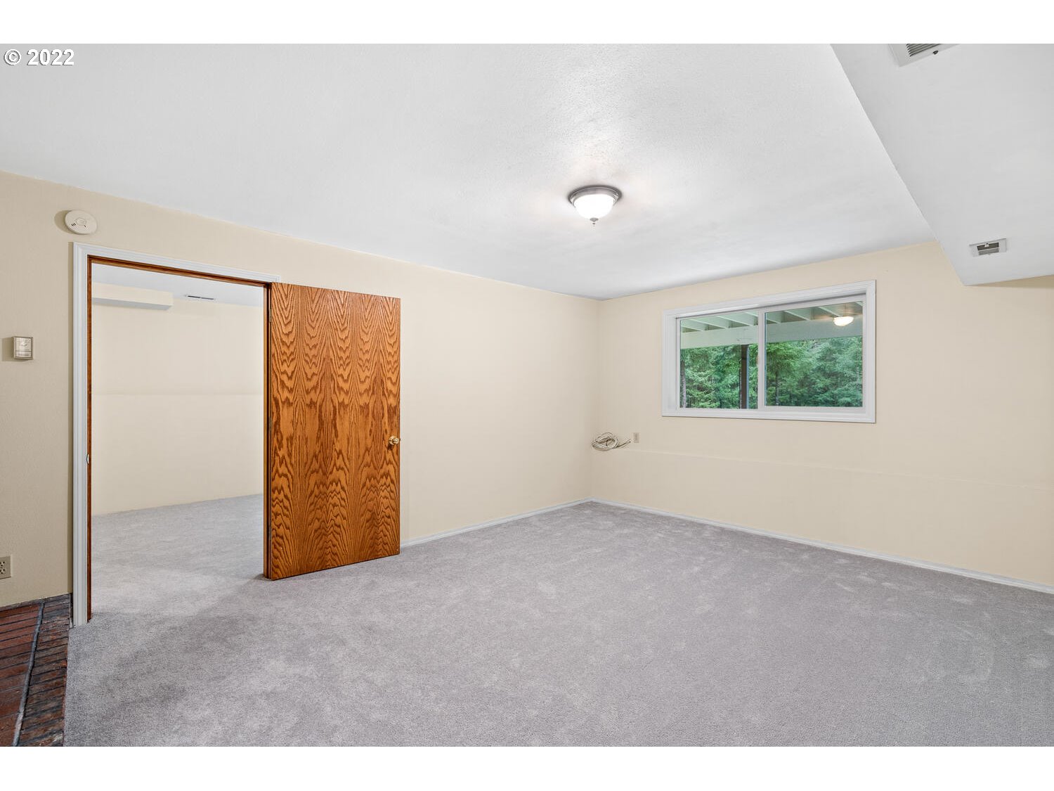 21114 Northwest 43rd Avenue Ridgefield, WA 98642 - Photo 26 of 32 an empty room with windows