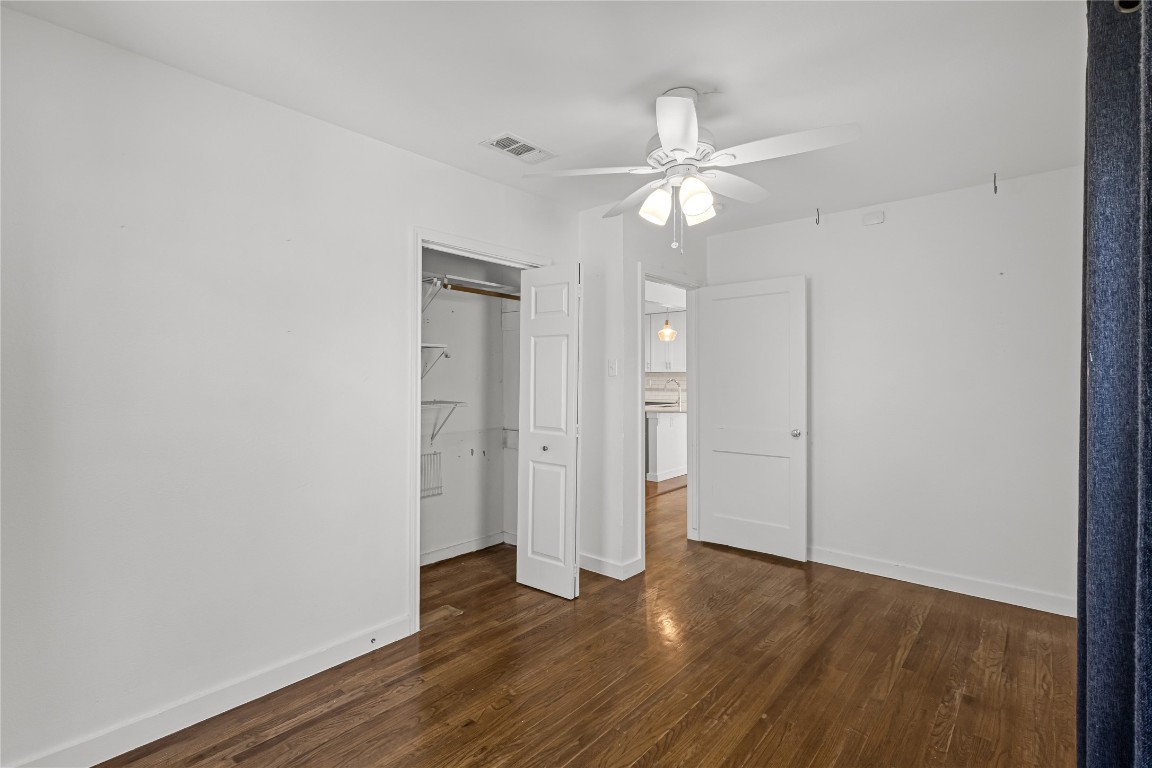 713 East 45th Street Austin, TX 78751 - Photo 15 of 28 a view of an empty room with wooden floor