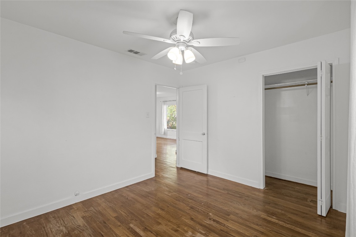 713 East 45th Street Austin, TX 78751 - Photo 18 of 28 a view of an empty room with wooden floor