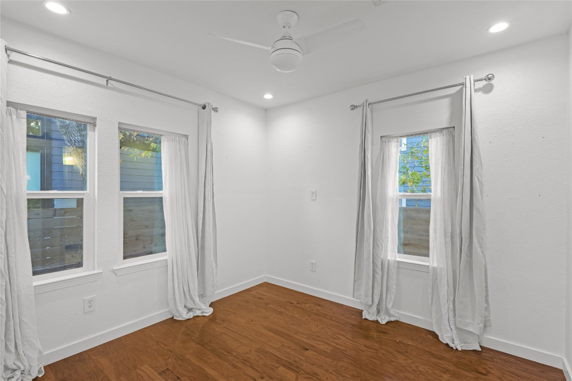 713 East 45th Street Austin, TX 78751 - Photo 19 of 28 a view of empty room with wooden floor and fan