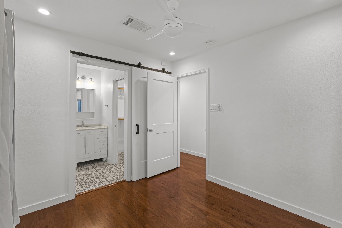 713 East 45th Street Austin, TX 78751 - Photo 20 of 28 a bathroom with a sink and a mirror