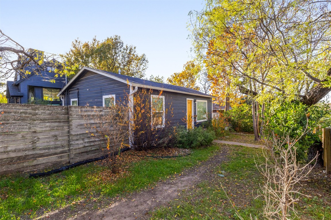 713 East 45th Street Austin, TX 78751 - Photo 2 of 28 a view of a backyard with plants and large tree