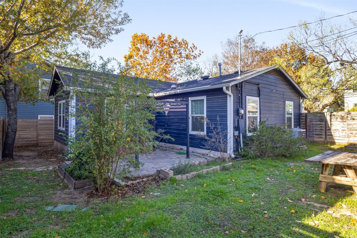 713 East 45th Street Austin, TX 78751 - Photo 26 of 28 a view of a backyard with plants and large tree