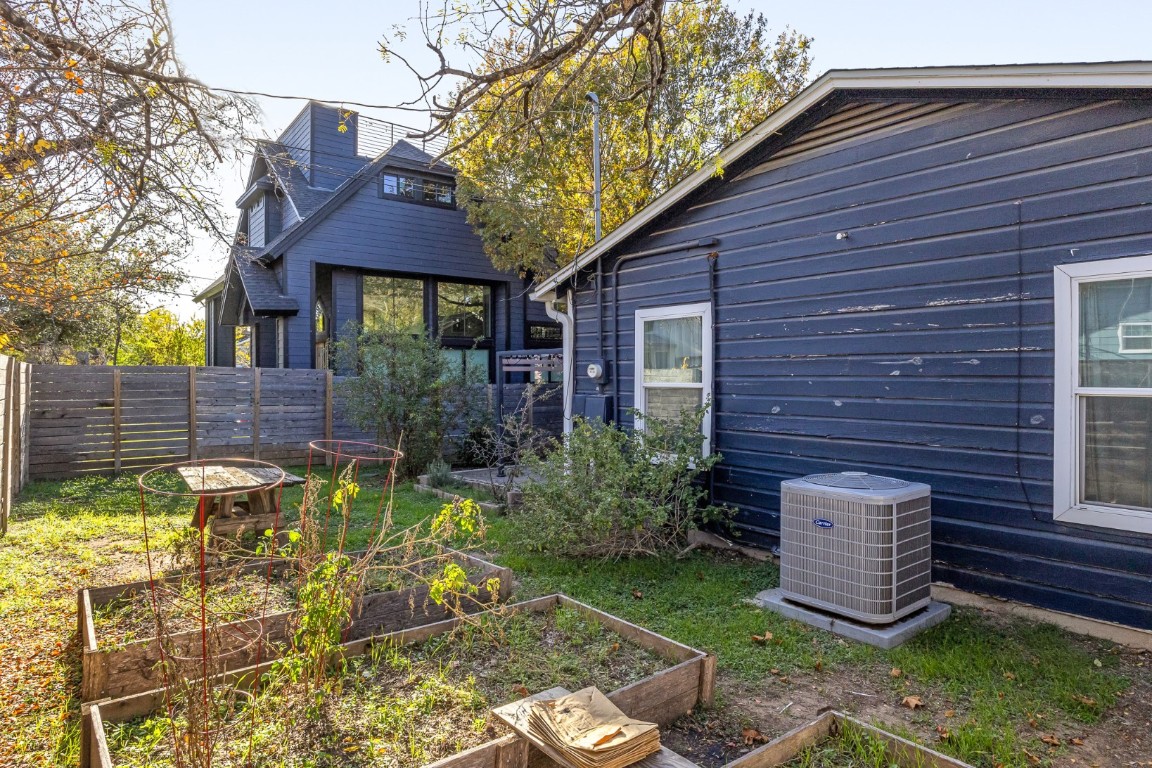 713 East 45th Street Austin, TX 78751 - Photo 28 of 28 a view of a chair and table in backyard of the house