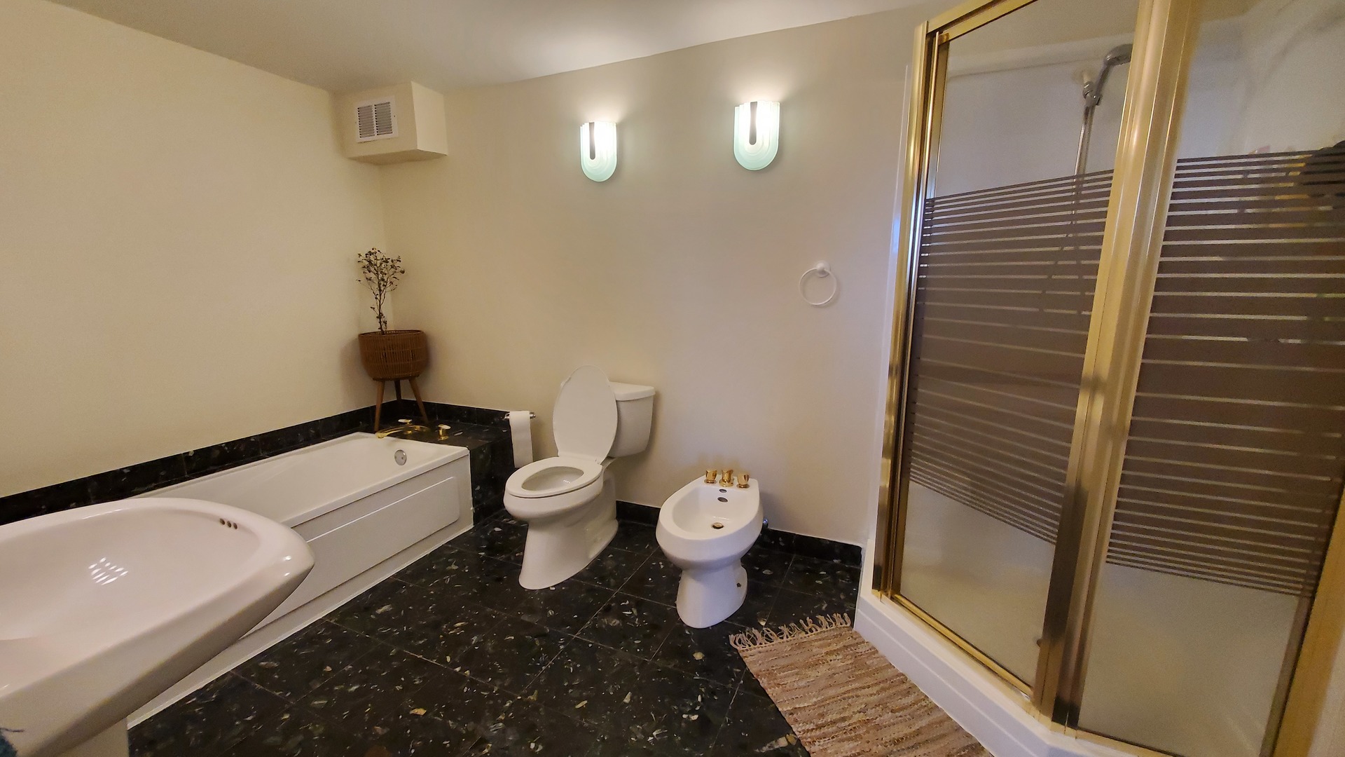 20 North Tower Road, Unit 6J Oak Brook, IL 60523 - Photo 12 of 23 a bathroom with a toilet and a shower