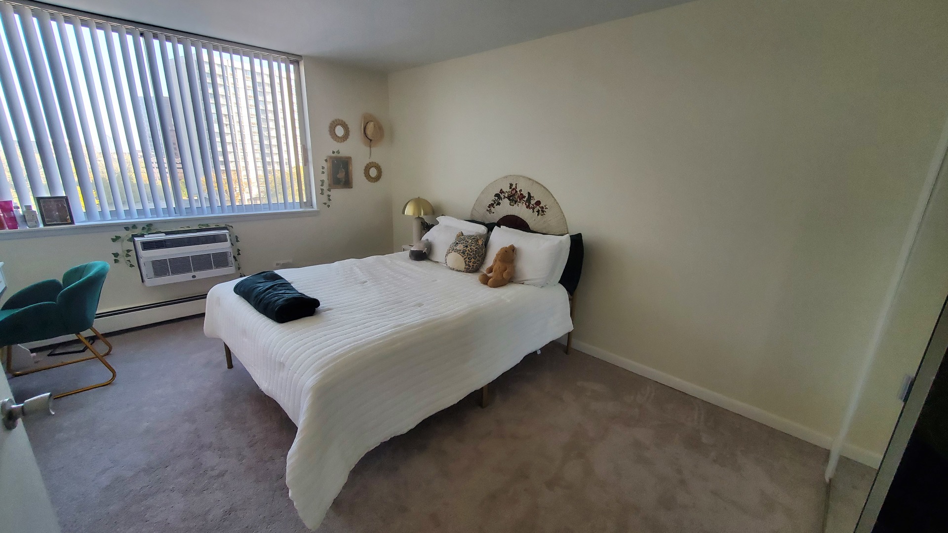 20 North Tower Road, Unit 6J Oak Brook, IL 60523 - Photo 14 of 23 a bedroom with a bed and a window