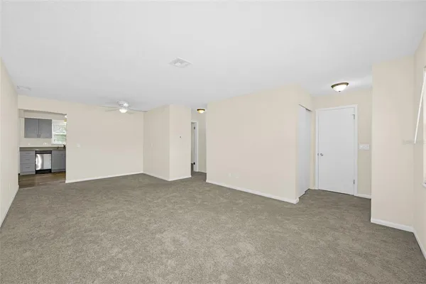 an empty room with fireplace