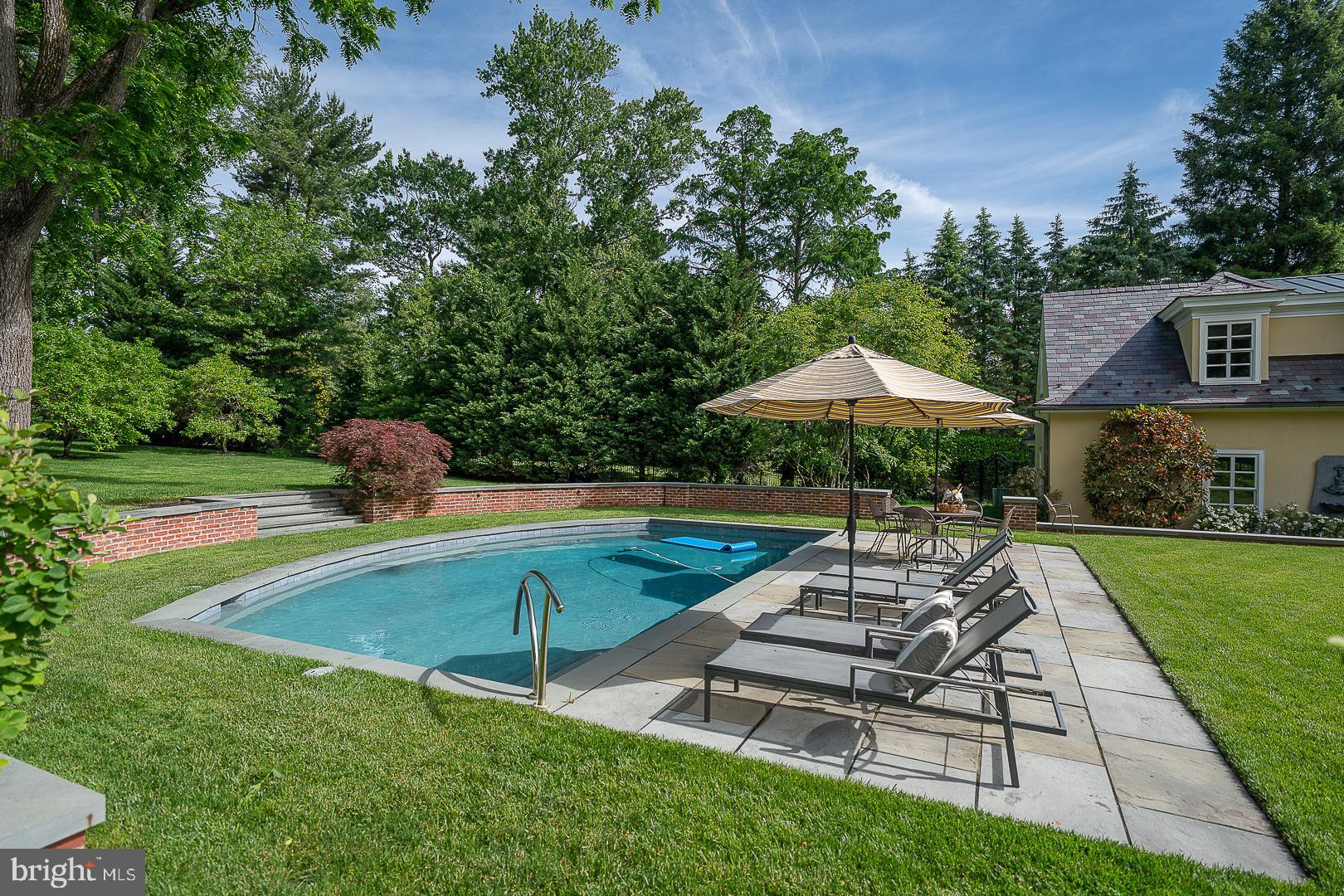 1122 Brynlawn Road Villanova, PA 19085 - Photo 8 of 46 swimming pool view with a seating space
