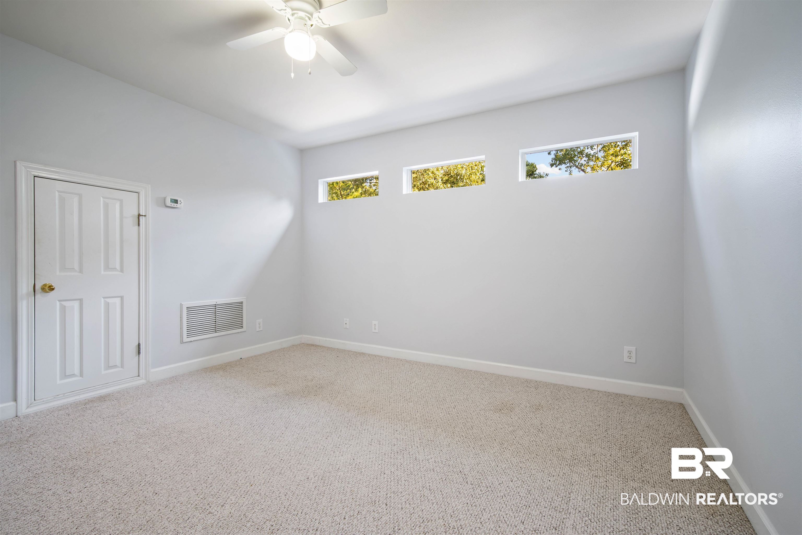 204 General Canby Loop Daphne, AL 36527 - Photo 26 of 36 Carpeted empty room featuring ceiling fan