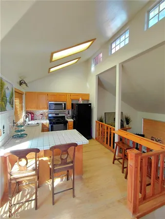 a bedroom with a bed and a table