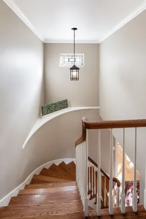 a view of a hallway with windows