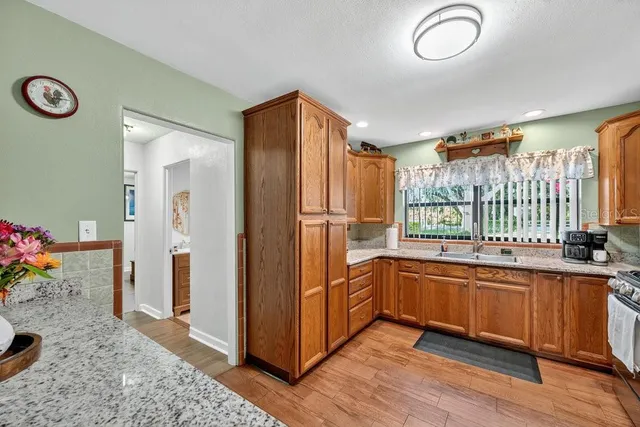 a view of a kitchen with a window
