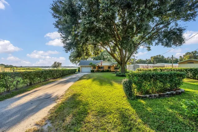 a view of swimming pool with a garden