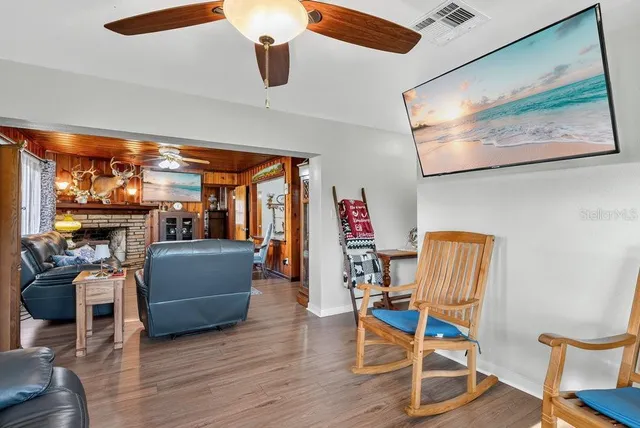 a room with furniture and a flat screen tv
