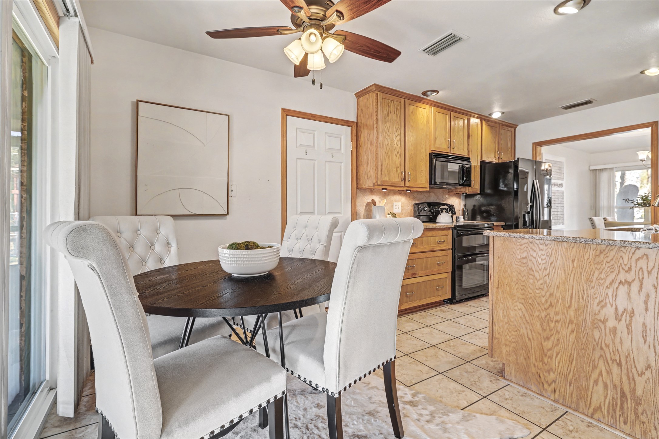 238 Mesa Drive Georgetown, TX 78628 - Photo 13 of 32 Kitchen nook dining with ceiling fan