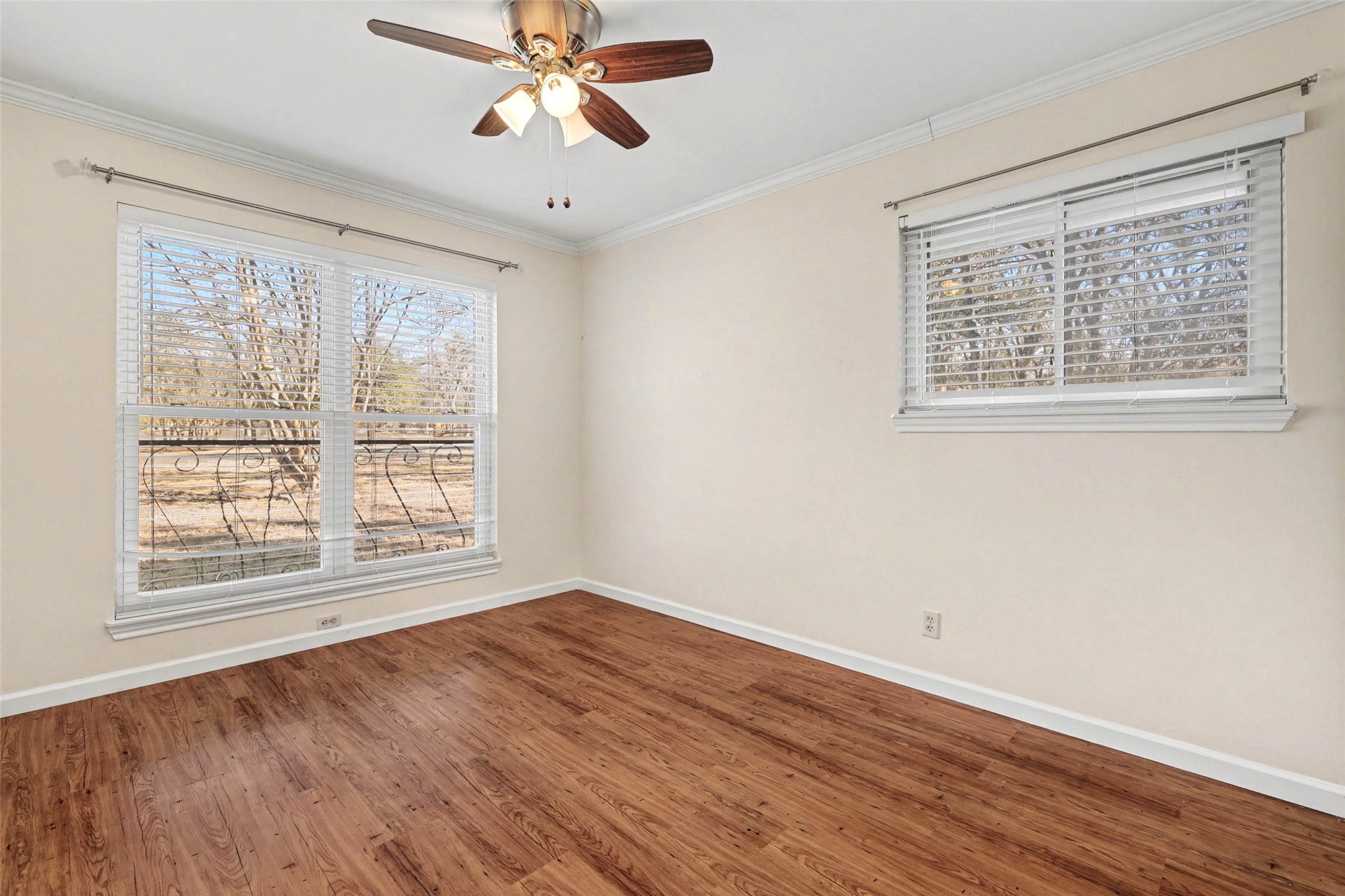 238 Mesa Drive Georgetown, TX 78628 - Photo 20 of 32 Front facing right bedroom with ceiling fan