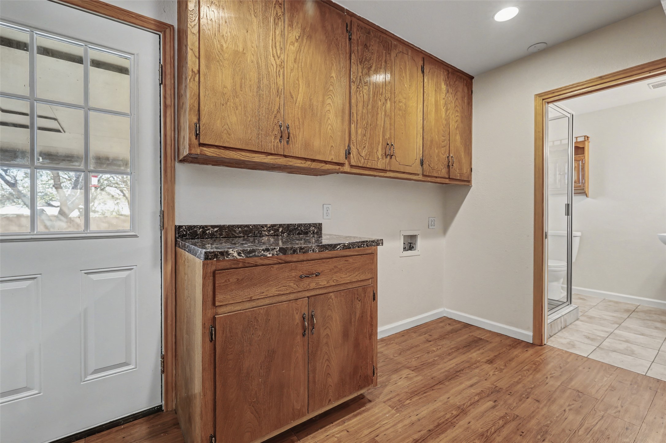 238 Mesa Drive Georgetown, TX 78628 - Photo 25 of 32 Indoor Laundry with upper cabinet storage, washer/dryer hookup, and recessed lighting