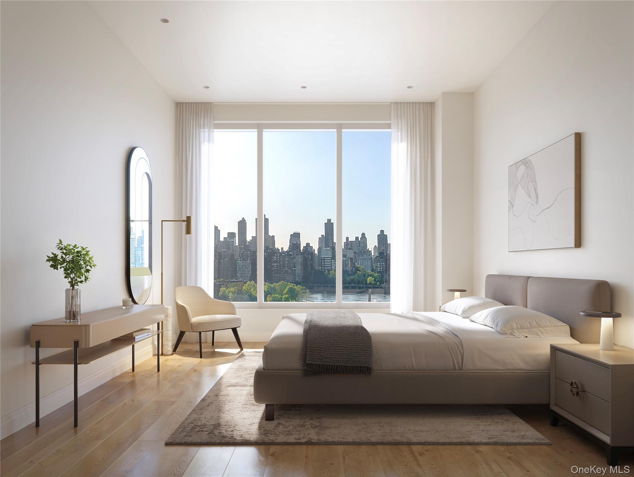 30-55 Vernon Boulevard, Unit 6P Queens, NY 11102 - Photo 4 of 11 Bedroom featuring a skyline view and wood finished floors