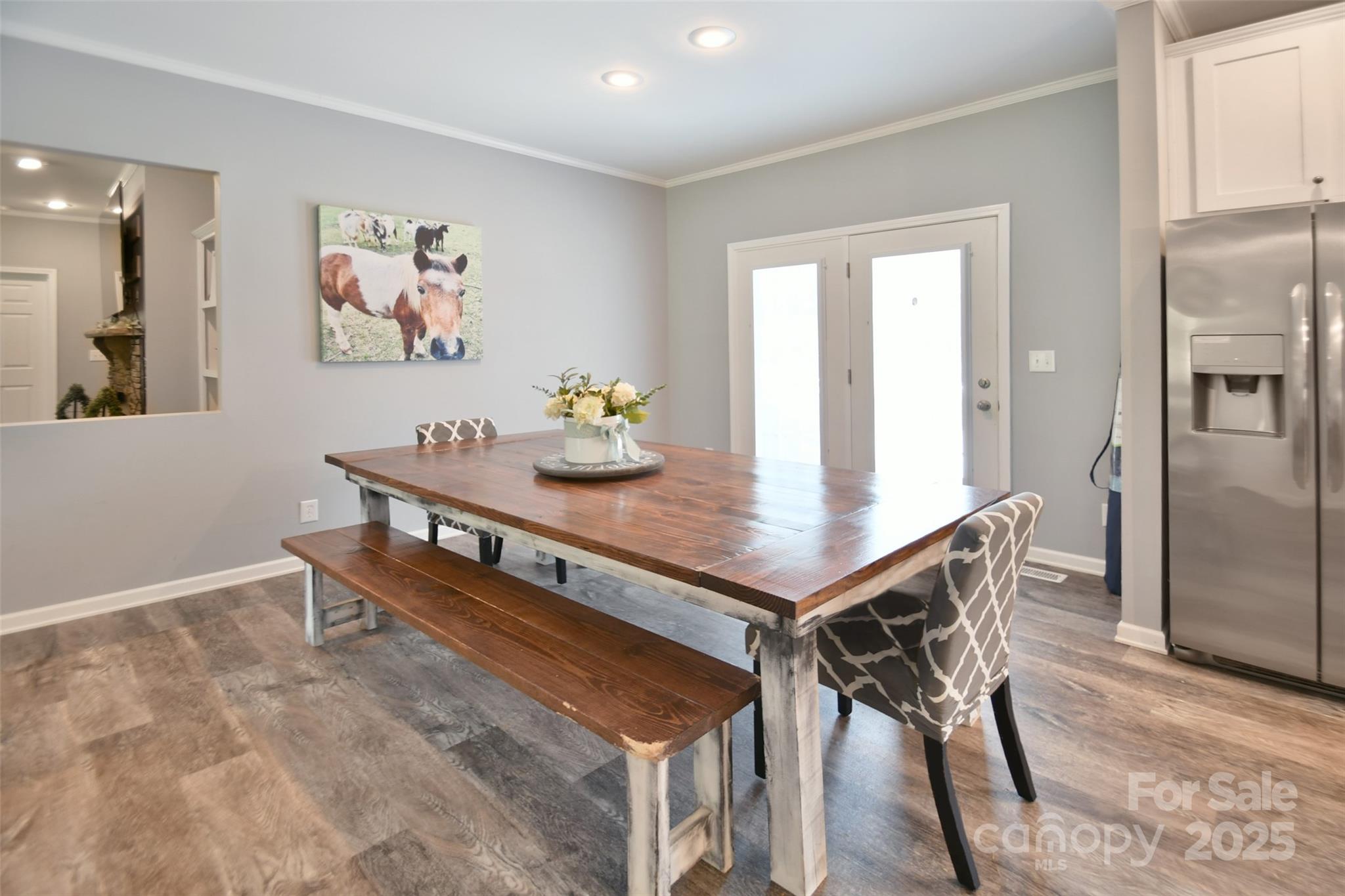 265 St Matthew Church Road Salisbury, NC 28146 - Photo 12 of 42 a view of a dining room with furniture