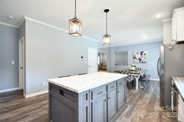 a view of a kitchen and a window
