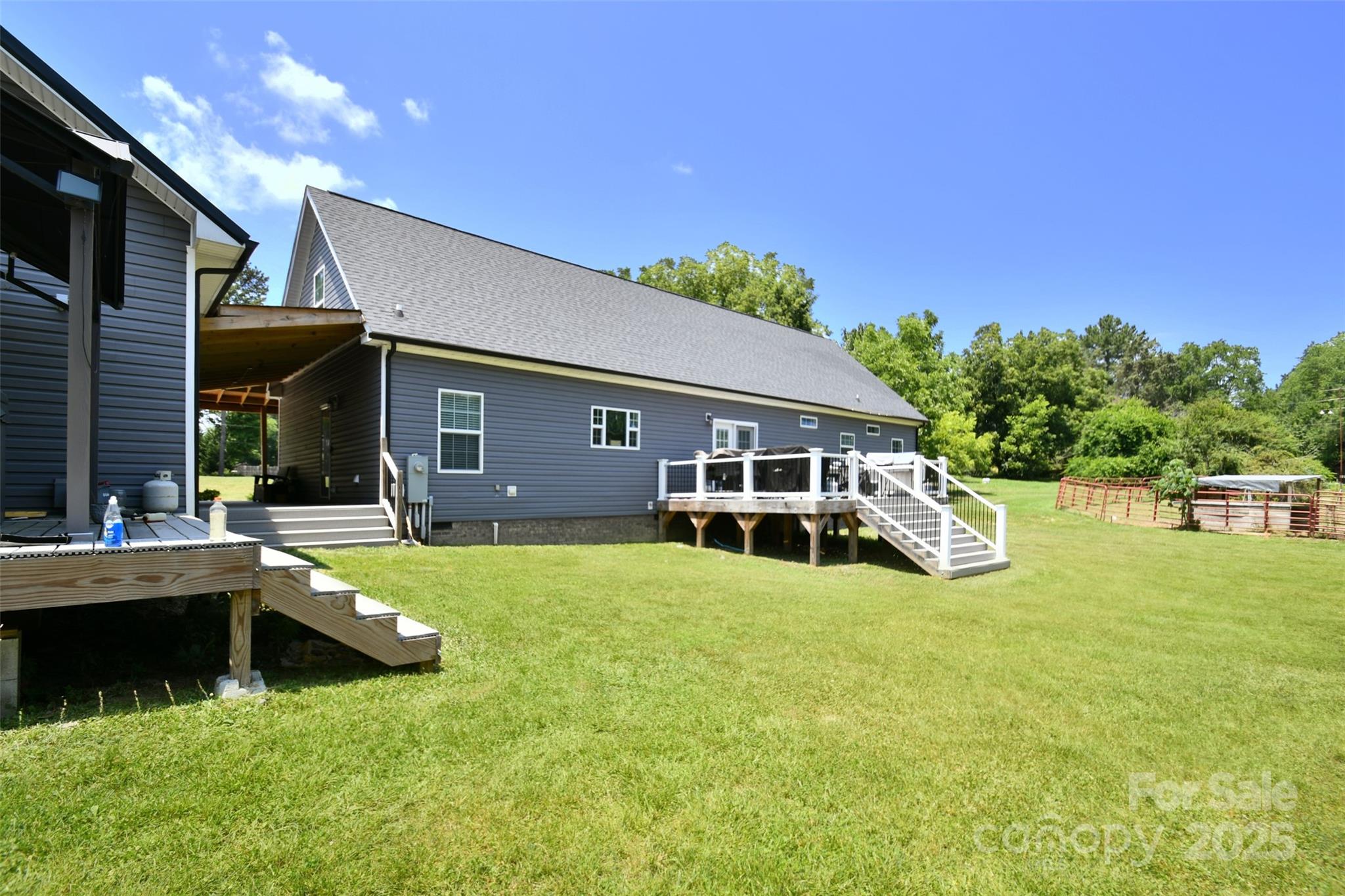 265 St Matthew Church Road Salisbury, NC 28146 - Photo 29 of 42 a view of a house with swimming pool and a yard