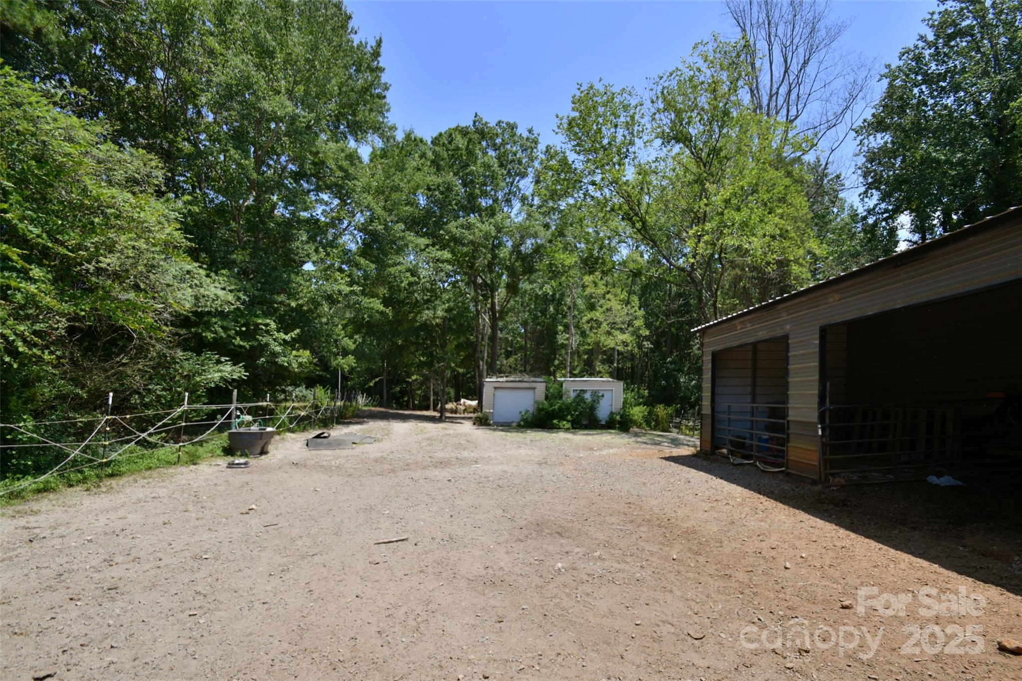 265 St Matthew Church Road Salisbury, NC 28146 - Photo 35 of 42 a view of a backyard with furniture and a tree