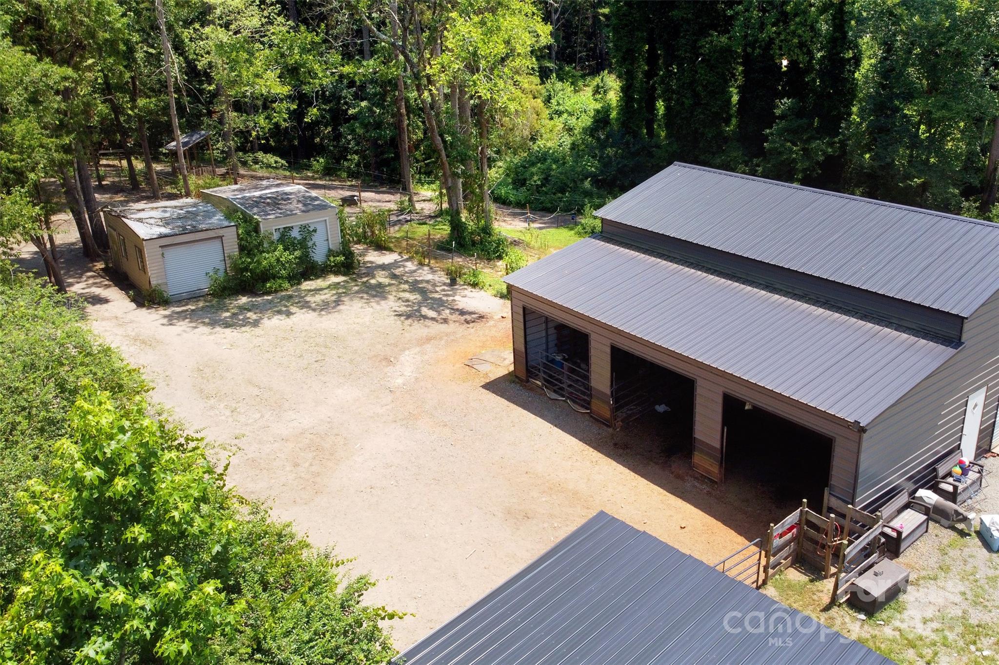 265 St Matthew Church Road Salisbury, NC 28146 - Photo 39 of 42 a view of a terrace with a bench