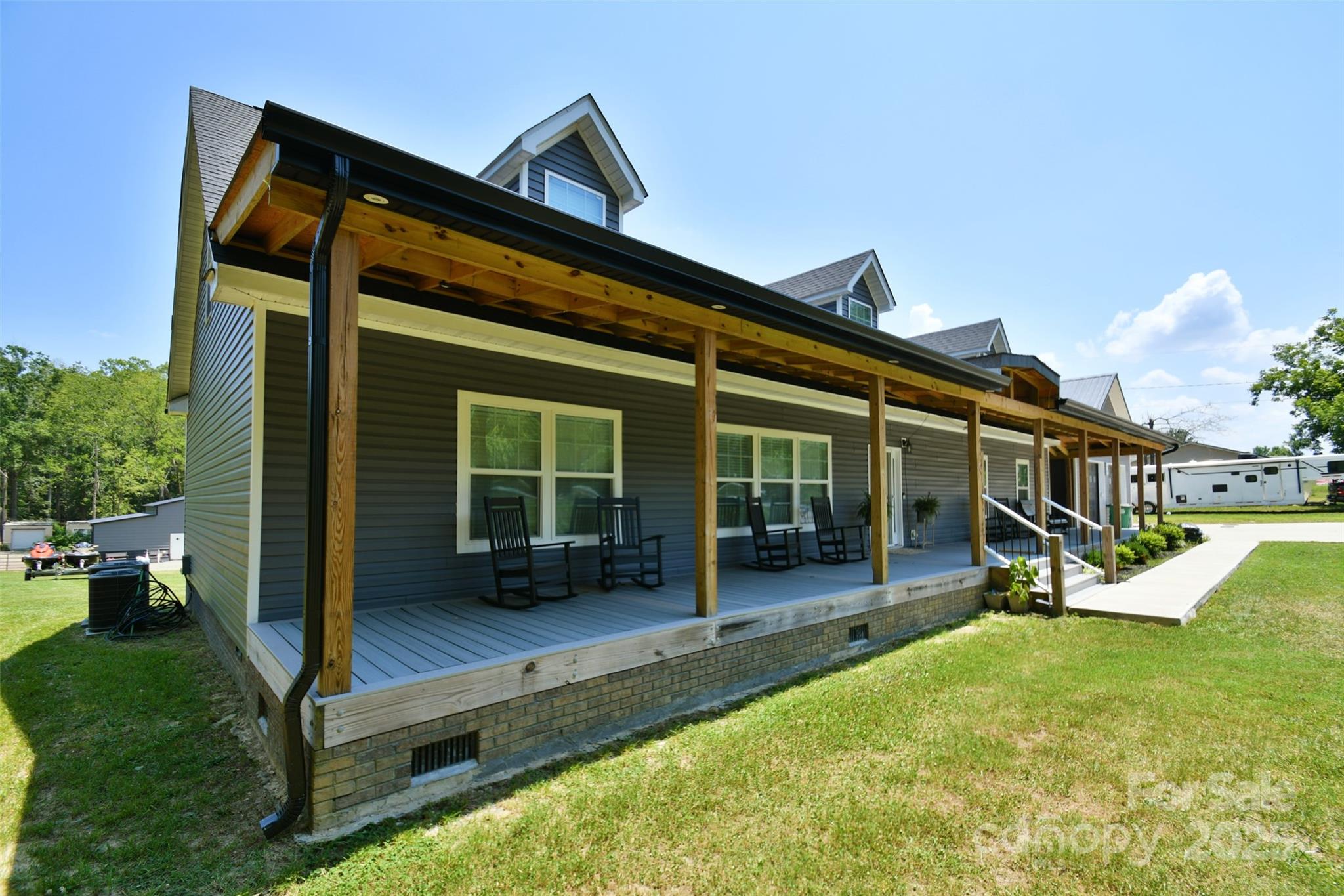 265 St Matthew Church Road Salisbury, NC 28146 - Photo 6 of 42 a view of a house with backyard porch and sitting area