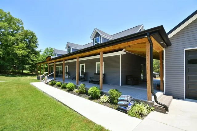 front view of a house with a yard