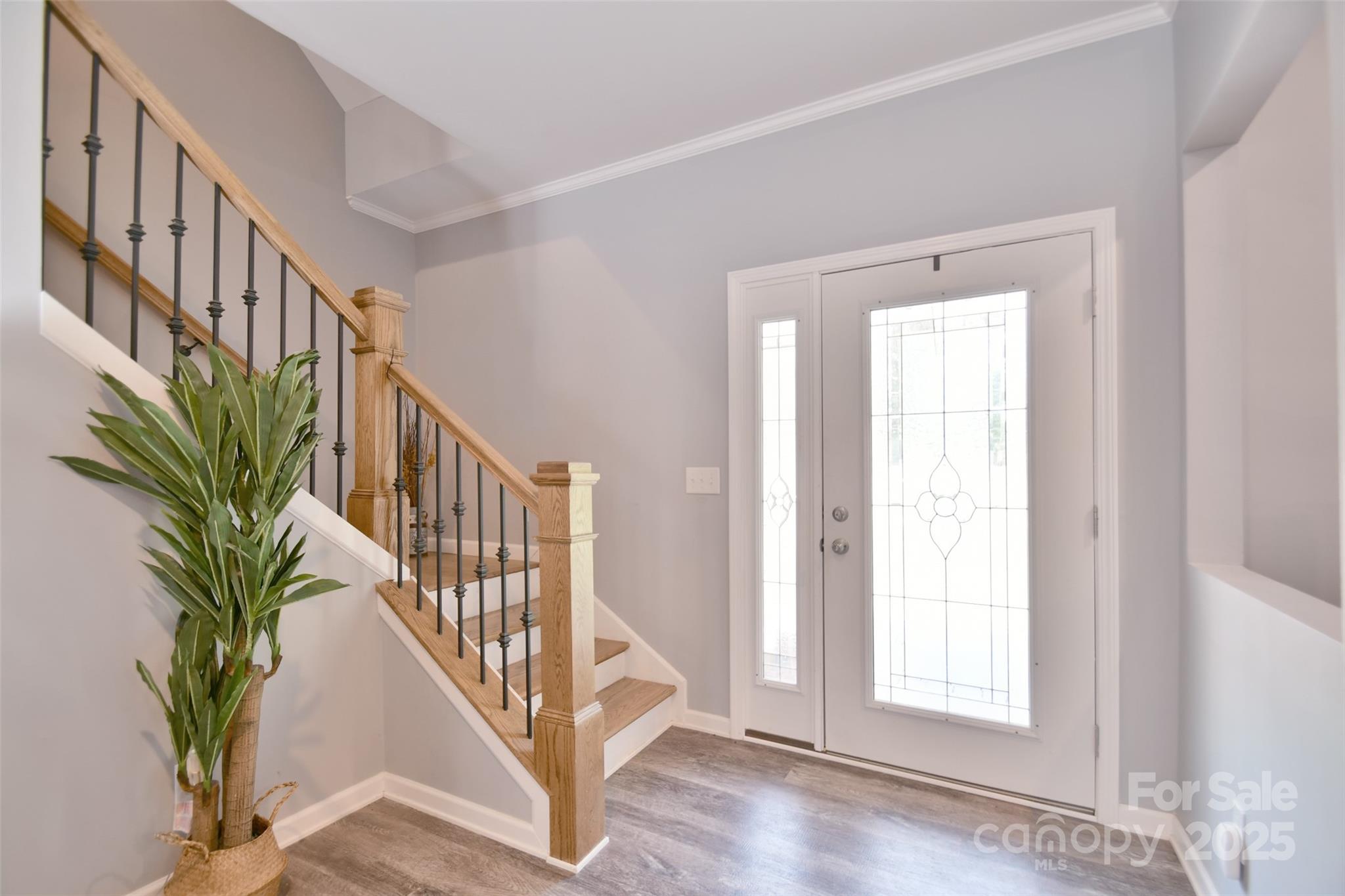 265 St Matthew Church Road Salisbury, NC 28146 - Photo 8 of 42 a view of staircase with railing and a potted plant