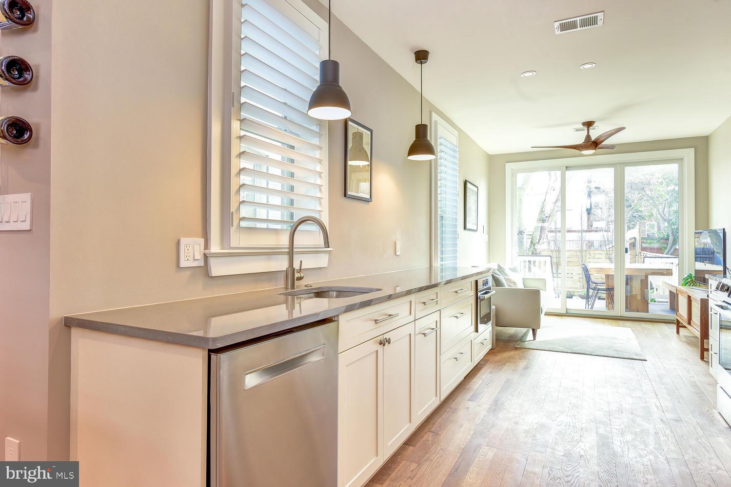 1017 7th Street Northeast Washington, DC 20002 - Photo 11 of 52 Custom Lighting & Plantation Shutters Throughout