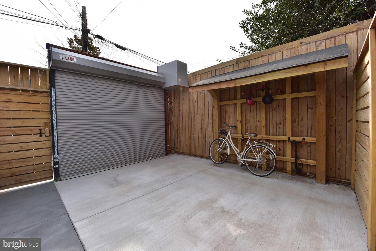1017 7th Street Northeast Washington, DC 20002 - Photo 41 of 52 Rolltop Garage Door, Custom Bike Storage