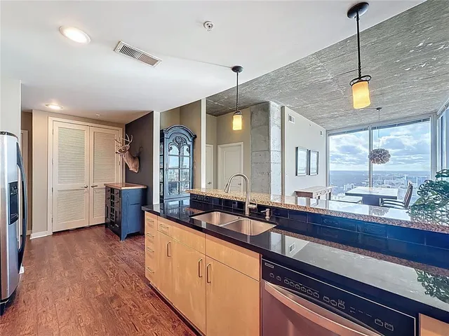 a view of a living room with a large window