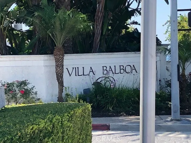 a sign that is on the side of the building