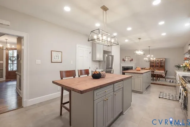 a kitchen with a sink a counter top space and appliances