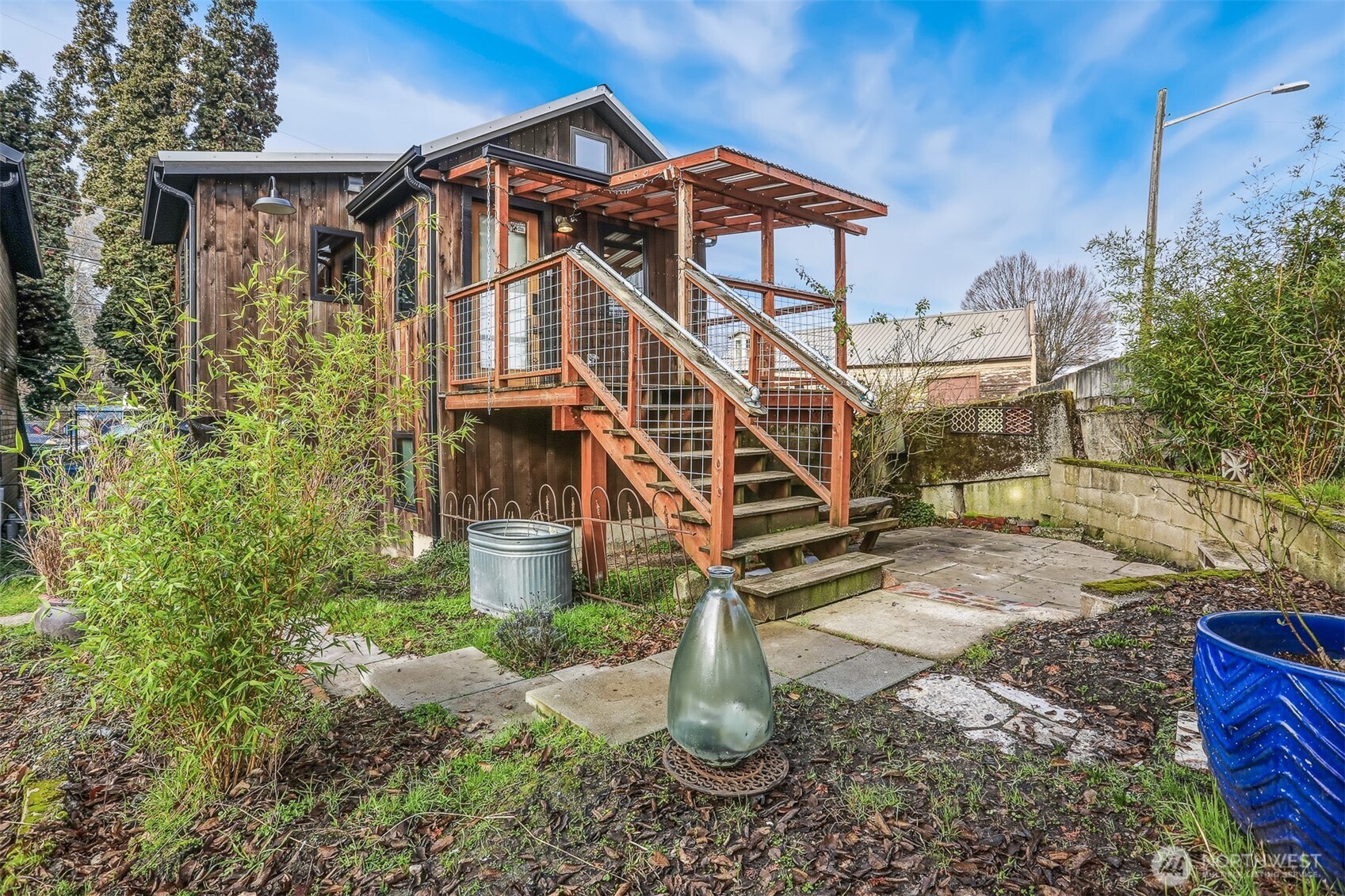 3868 16th Avenue Southwest Seattle, WA 98106 - Photo 2 of 37 a house view with a garden space